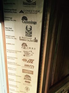 Engraved logos of the primary sponsors for the 2015 WoodMobile on Maple panels